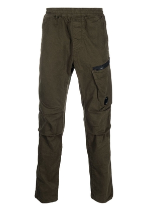 C.P. Company logo-patch tapered-leg trousers - Green