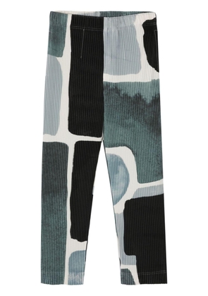 Homme Plissé Issey Miyake abstract-print plissé trousers - Black