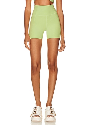 Girlfriend Collective High-Rise Running Short in Key Lime - Green. Size M (also in ).