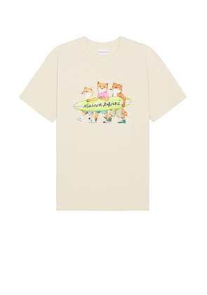 Maison Kitsune Surfing Foxes Comfort T-shirt in Paper - Yellow. Size L (also in M, S, XL/1X).