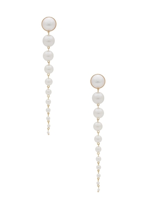 Ettika Long Beaded Pearl Drop Earrings in White.