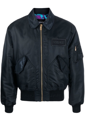 Versace logo-patch padded bomber jacket - Black