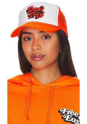 Free & Easy Don't Trip Embroidered Trucker Hat in Orange.