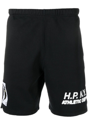 Heron Preston slogan-print cotton shorts - Black