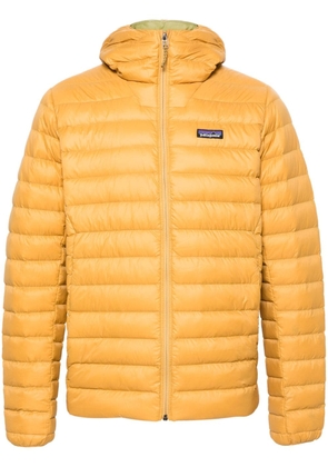Patagonia logo-patch hooded down jacket - Yellow