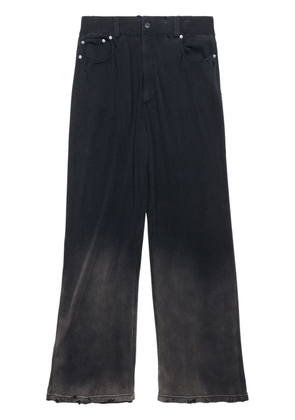 Balenciaga distressed-effect corduroy trousers - Black