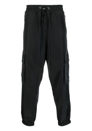 Balmain embossed-logo modal-blend cargo pants - Black