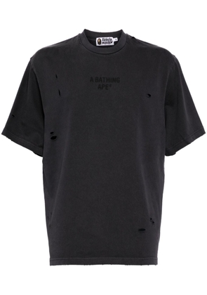 A BATHING APE® distressed logo-print cotton t-shirt - Black