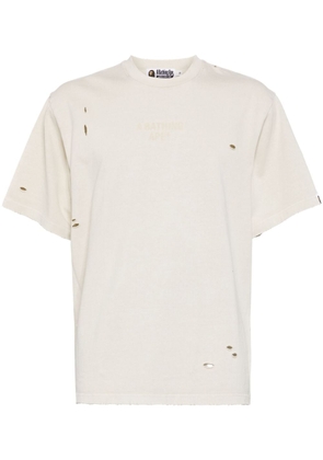 A BATHING APE® distressed logo-print cotton t-shirt - Neutrals