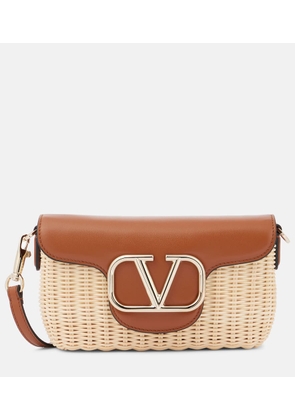 Valentino Garavani Locò Small woven leather-trimmed shoulder bag