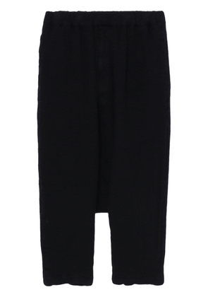 Black Comme Des Garçons drop-crotch cropped trousers