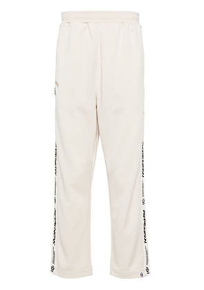 AAPE BY *A BATHING APE® logo-embroidered track pants - Neutrals