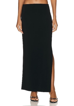 Norma Kamali Side Slit Long Skirt in Black - Black. Size L (also in M, S, XL, XS).