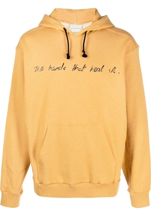 Bethany Williams slogan-print drawstring hoodie - Yellow