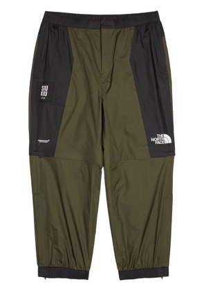 The North Face x Undercover Soukuu shell track pants - Green