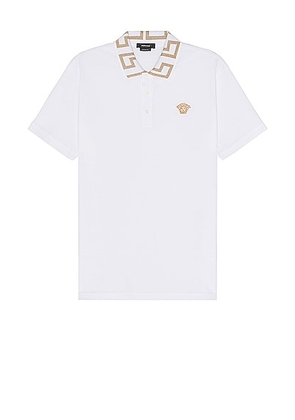 VERSACE Polo in Optical White - White. Size L (also in M, S, XL).