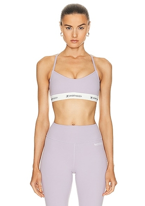 Sporty & Rich 80s Runner Sports Bra in Faded Lilac & Black - Lavender. Size L (also in ).