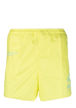 Haider Ackermann logo-print swim shorts - Yellow