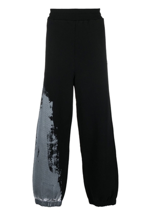 A-COLD-WALL* abstract-print track pants - Black