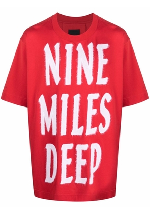 Givenchy slogan-print drop-shoulder T-shirt - Red