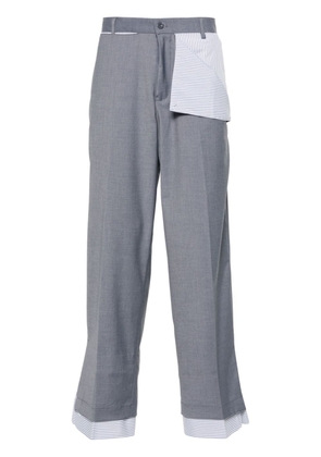 KidSuper layered-detailing trousers - Grey