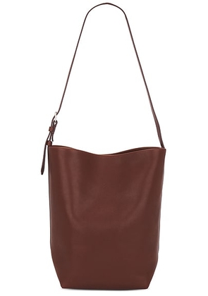 The Row Medium Park Tote Belt in New Burgundy - Burgundy. Size all.