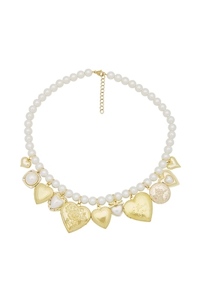 petit moments x REVOLVE Heart Charm Necklace in Metallic Gold.