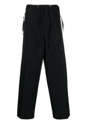 FENDI logo-patch wide-leg trousers - Black