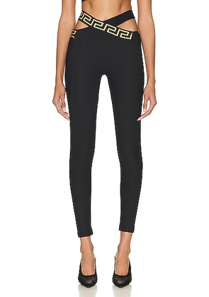 VERSACE Criss Cross Band Legging in Nero - Black. Size XL (also in ).