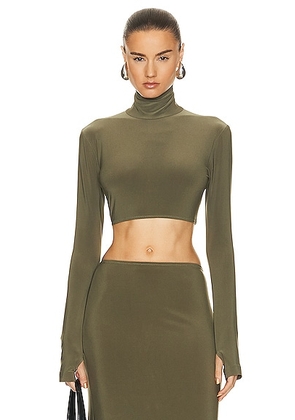 Norma Kamali Cropped Slim Fit Long Sleeve Turtleneck Top in Military - Army. Size S (also in ).