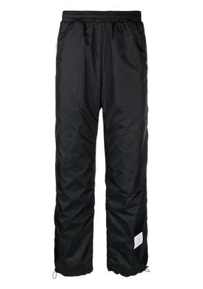 Thom Browne logo-patch sheer-ripstop track pants - Blue