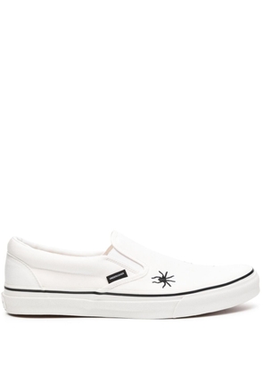 Undercover embroidered-detail slip-on sneakers - White