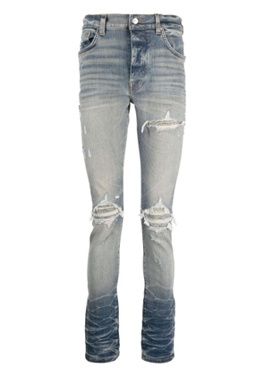 AMIRI distressed slim-cut jeans - Blue