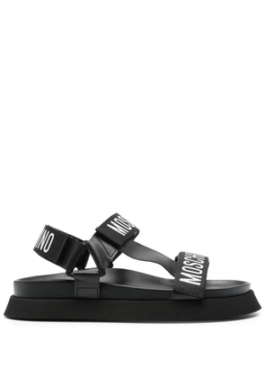 Moschino logo-tape flat sandals - Black