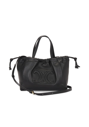 FWRD Renew Celine Triomphe Drawstring Handbag in Black.