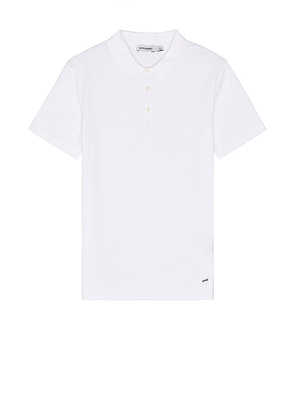 SIMKHAI Barron Short Sleeve Polo in White. Size S.