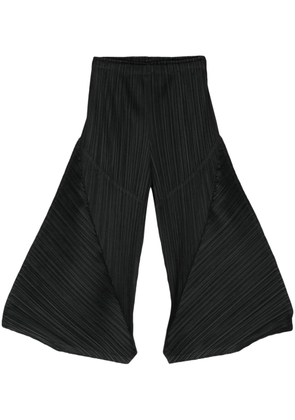 Pleats Please Issey Miyake plissé cropped trousers - Black