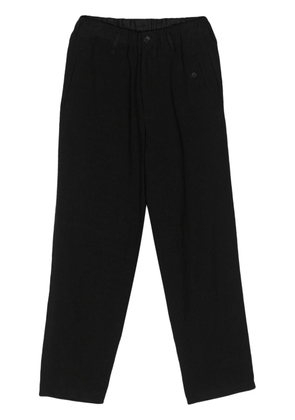 Yohji Yamamoto drawstring-waist tapered trousers - Black
