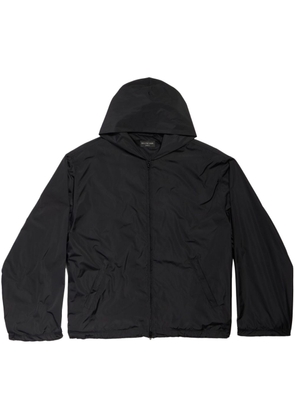 Balenciaga Ramadan logo-print hooded rain jacket - Black