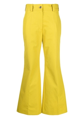 Patou logo-embroidered flared trousers - Yellow