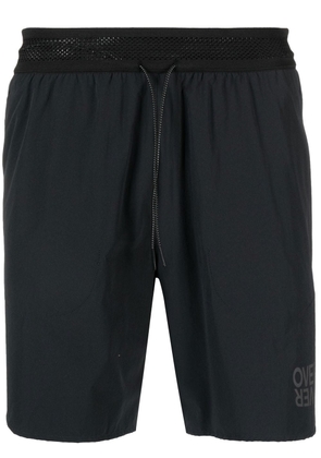 OVER OVER logo-print gym shorts - Black