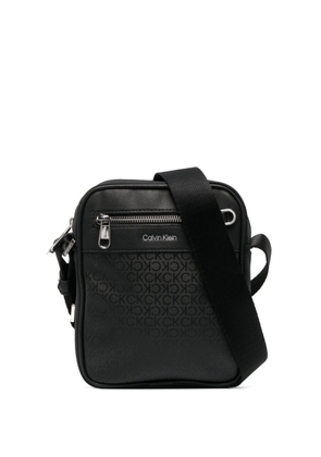Calvin Klein monogram-print zipped messenger bag - Black