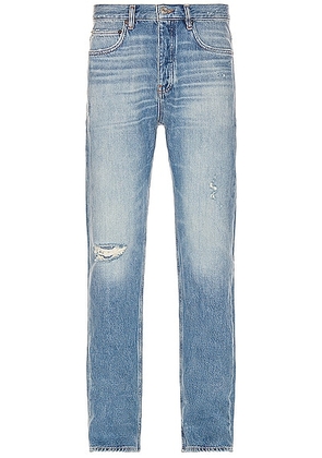 FRAME Distressed Straight Jean in Vintage Blue - Blue. Size 30 (also in ).