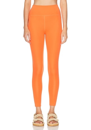 Beyond Yoga Powerbeyond Strive High Waisted Midi Legging in Sunset Orange - Orange. Size L (also in M, S, XS).