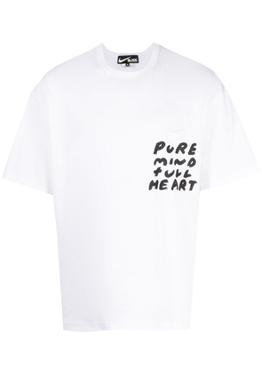 Black Comme Des Garçons graphic-print cotton T-shirt - White