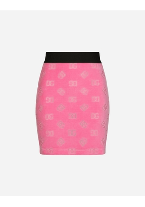 Dolce & Gabbana Flocked Jersey Miniskirt With All-over Dg Logo - Woman Skirts Pink Cotton 46
