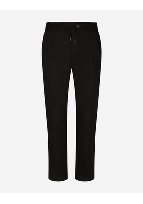 Dolce & Gabbana Stretch Cotton Jogging Pants With Plate - Man Trousers And Shorts Black 54