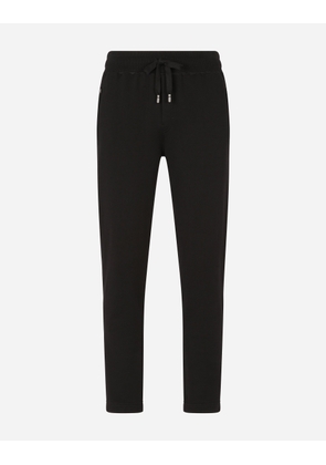 Dolce & Gabbana Jersey Jogging Pants With Branded Plate - Man Trousers And Shorts Black Cotton 54