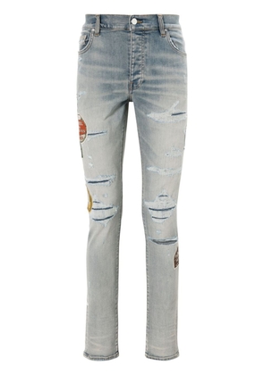 AMIRI Travel Patch Repair skinny jeans - Blue