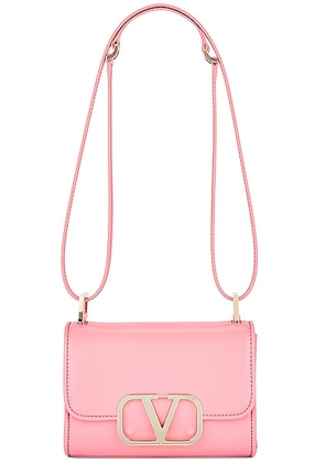 Valentino Garavani Small V Logo Type Shoulder Bag in Candy Rose - Pink. Size all.